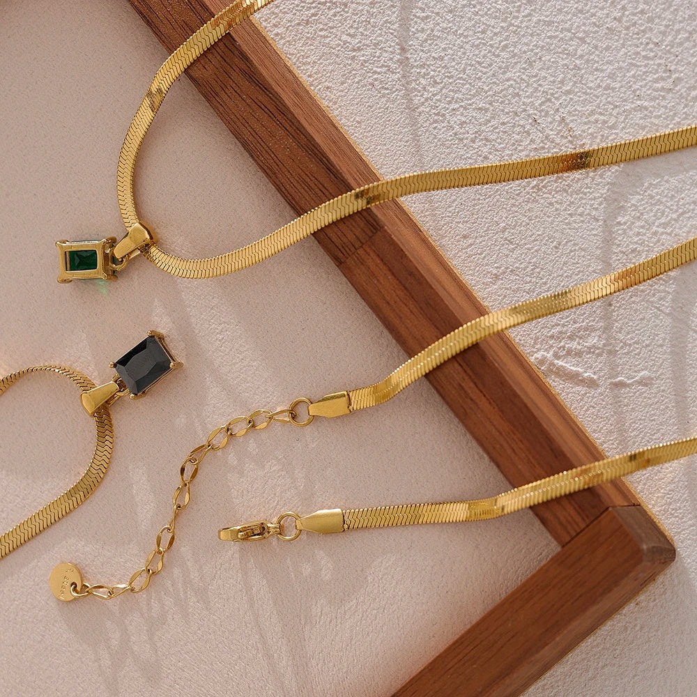Nova Glow - Gold Flat Snake Necklace with Green Crystal - Image 5